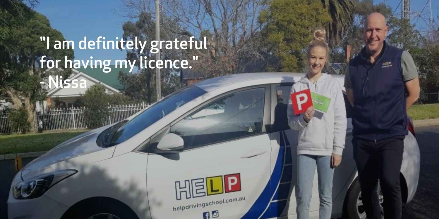 Girl standing next to car with her L2P mentor, quote reads "I am definitely grateful to have my license"