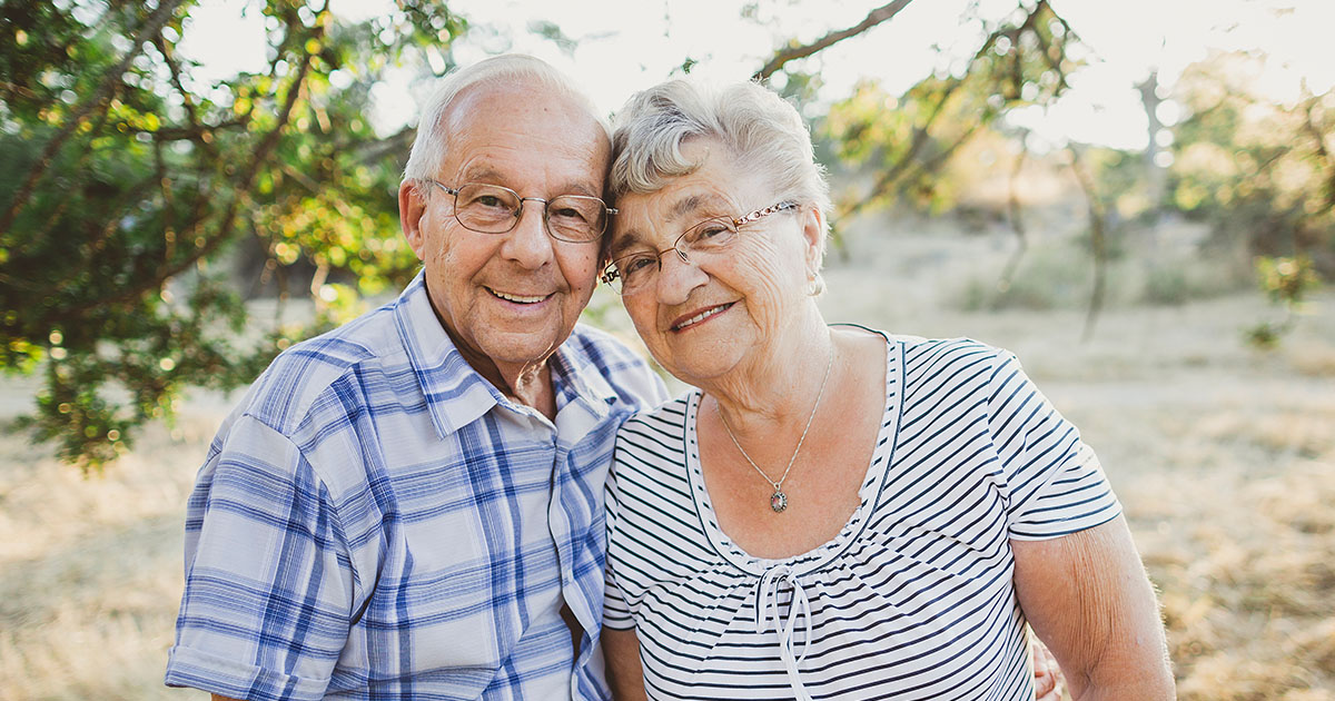 Elder couple looking happy