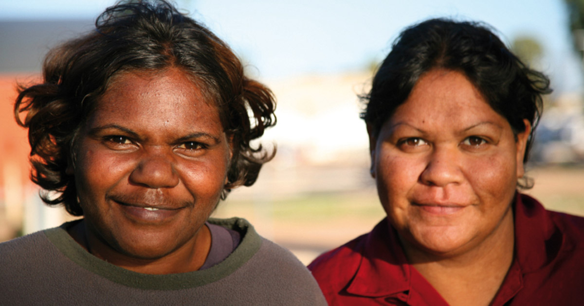 Two indigenous ladies smiling