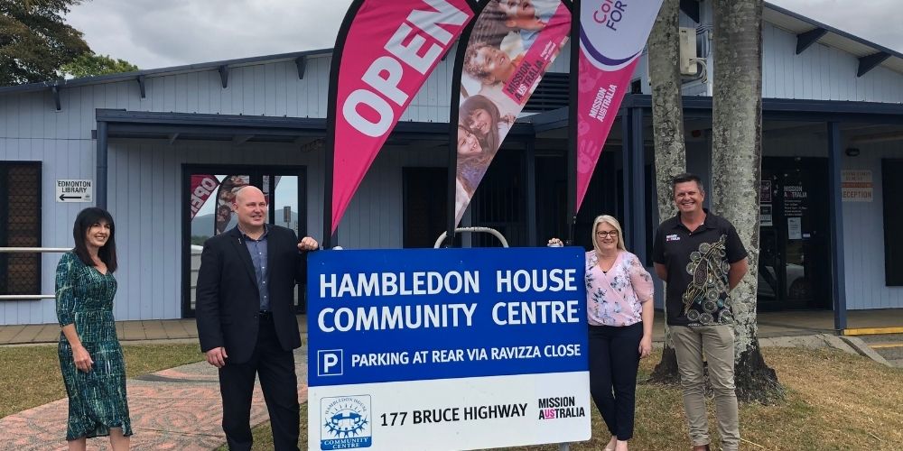 People standing outside Hambledon House smiling on the open day