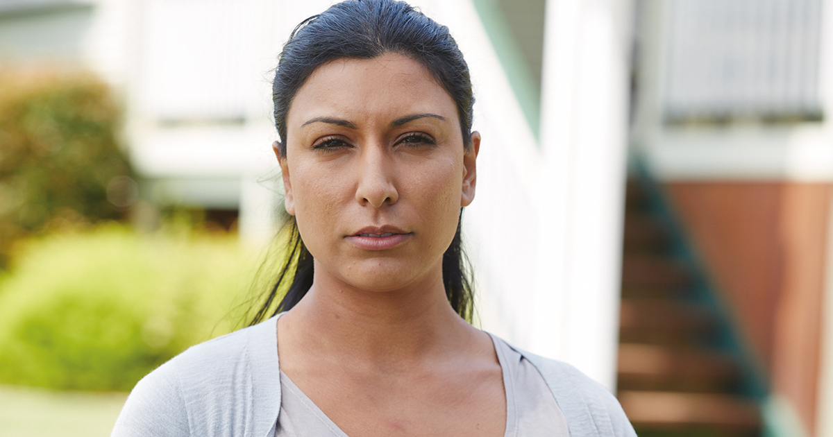 A woman looking meaningfully at the camera