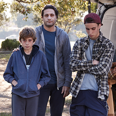 Family in front of a van