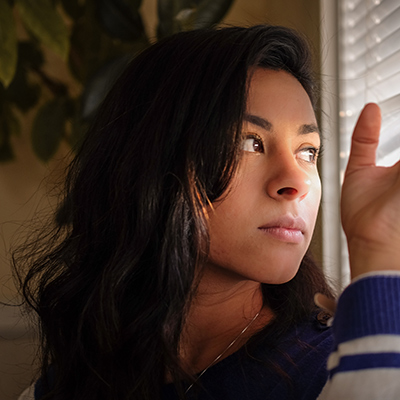 Woman looking out of the window