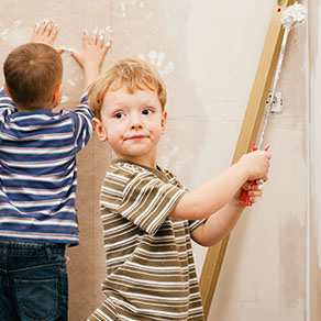 Boys playing with paint