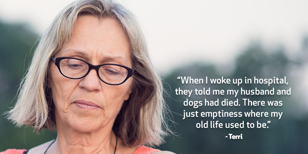 Terri looks down with a sad look on her face. Text on image reads. ‘When I woke up in hospital, they told me my husband and dogs had died. There was just emptiness where my old life used to be.’