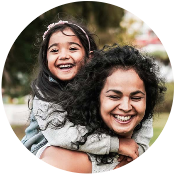 Mother and daughter looking happy