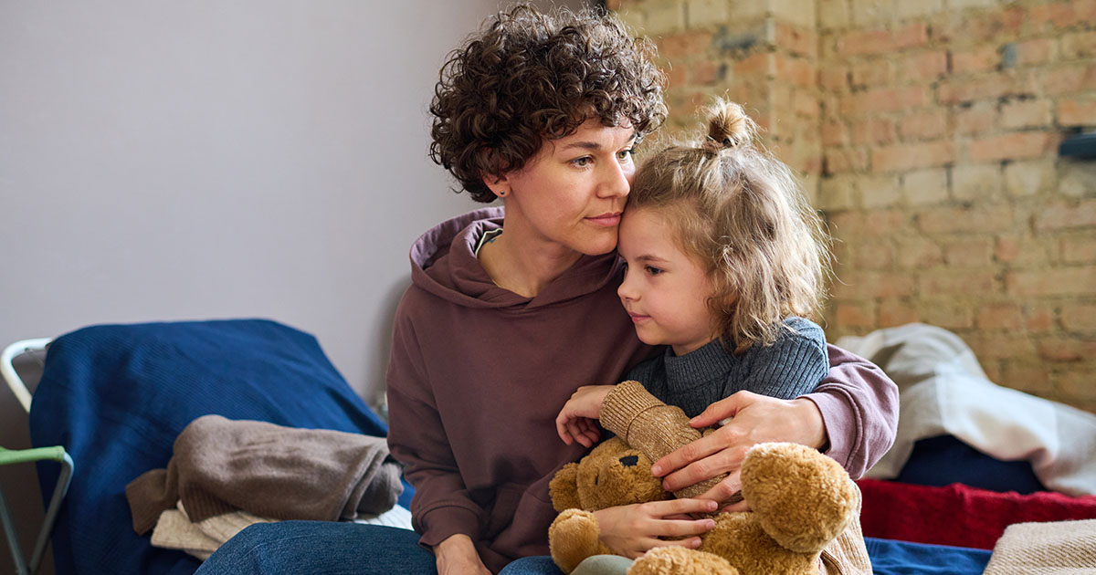 Mother and daughter looking hopeful