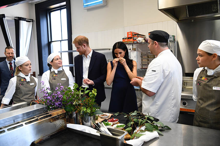 The Duke and Duchess having conversation with Charcoal Lane workers