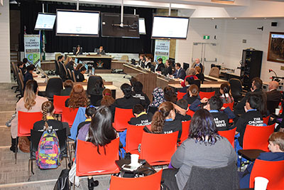 School children in the parliament room