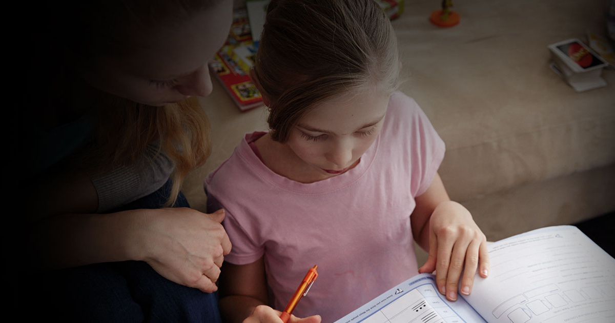 Mother and child doing homework