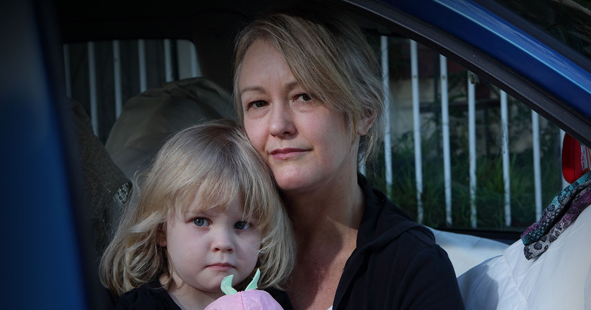 Woman with child in a car