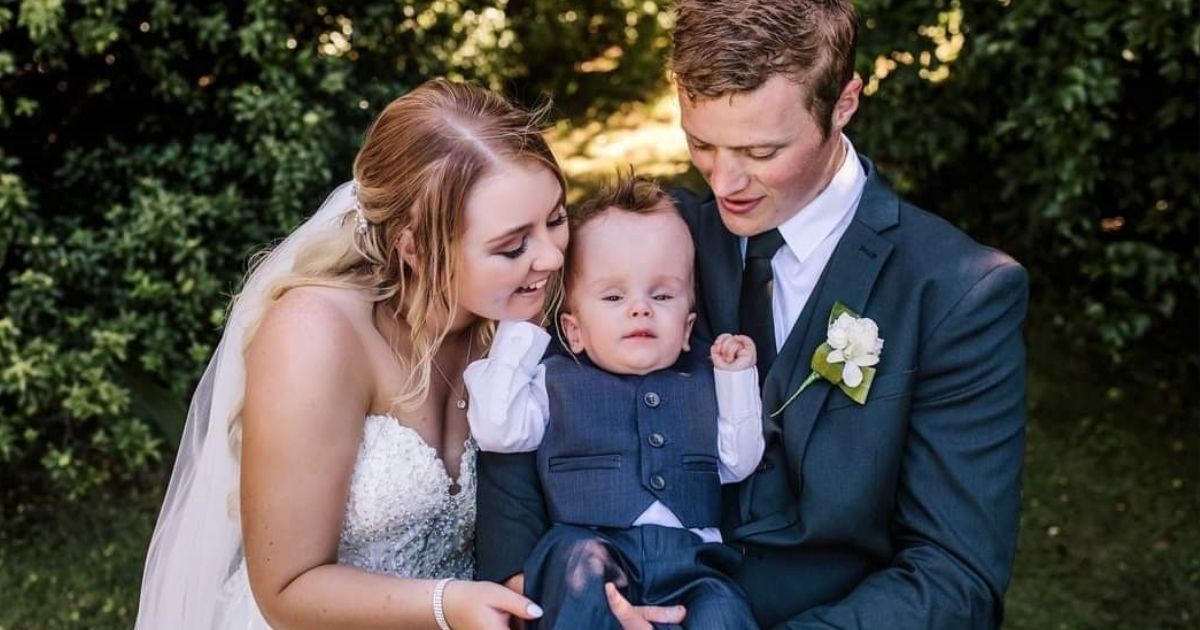 Maddison on her wedding day holding Lawson