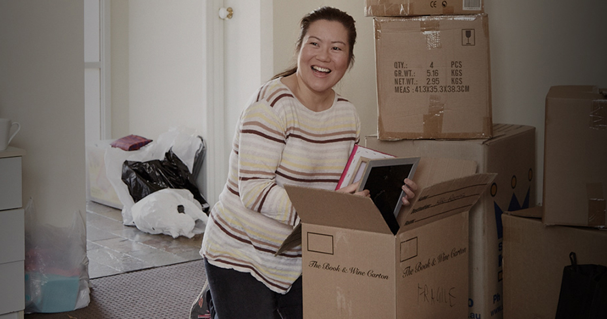 Woman unpacking boxes