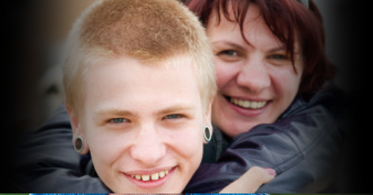 Boy and mother hugging