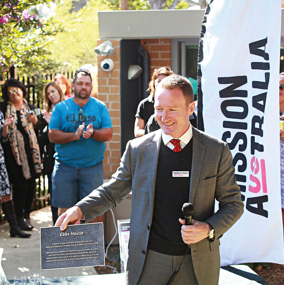 Photo of James Toomey with Ebbs House plaque.